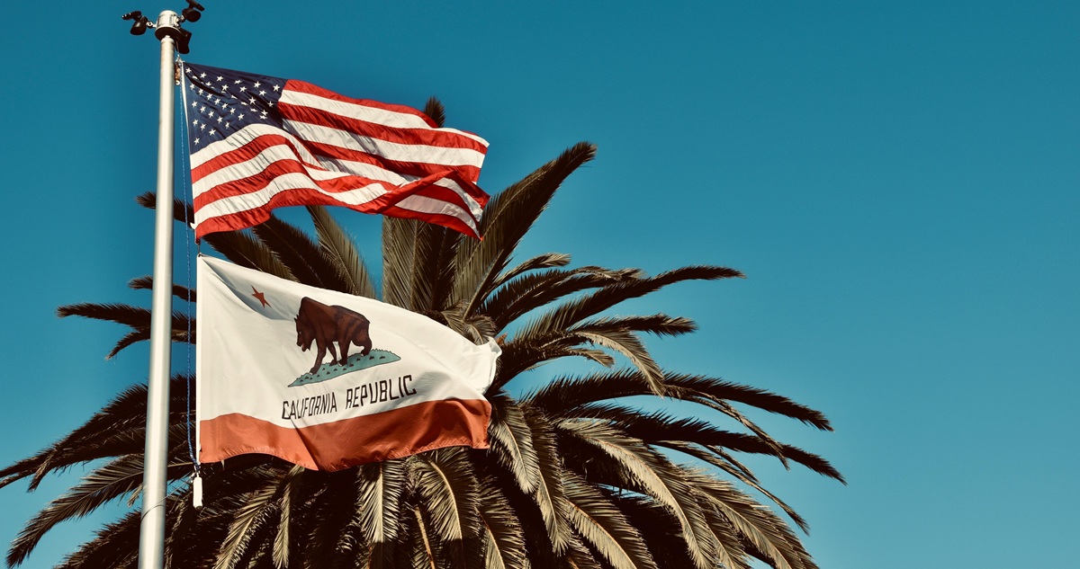 California Governor Race Withdraw Request Letter the American Flag and California State Flag Attached to a Flag Pole with a Palm Tree in the background